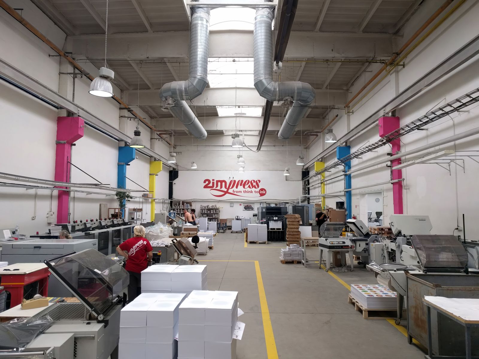 Vishwa Graphics production floor — finishing lines and packed print runs